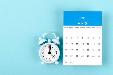 July 2023 Monthly calendar for 2023 year with vintage alarm clock on blue background. clipart