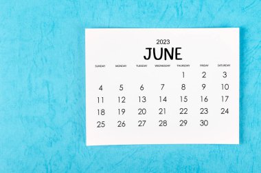 2023 Haziran takvimine göre mavi arka planda 2023 yılı.