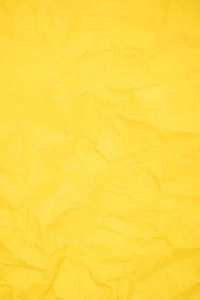 摘要垂直黄色折皱纸纹理为背景 — 图库照片
