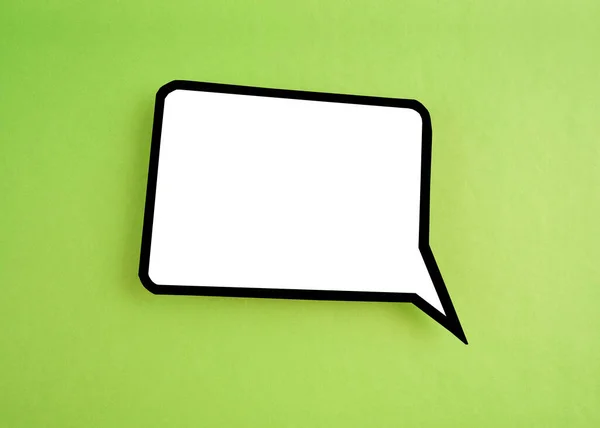 White Speech Bubble Shaped Post Note Green Background Copy Space — Stock Photo, Image