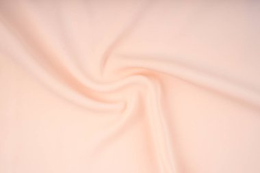 Arkaplan için bej renkli saten kumaşın dokusu