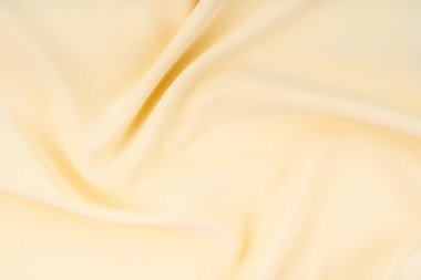 Arkaplan olarak güzel açık sarı renk ipeği dokusu.