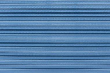 Mavi yuvarlanan çelik kapı desenli arka plan.