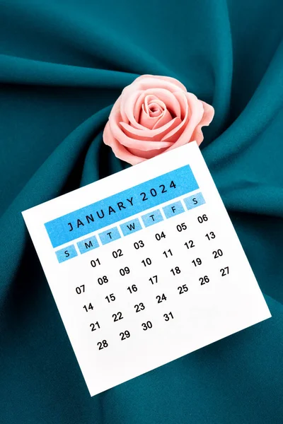 Enero 2024 Página Del Calendario Rosa Sobre Fondo Textil Verde —  Fotos de Stock