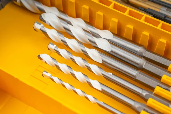 Close Drill Bits Set Professional Industrial Tools Equipment Yellow Box — Stock Photo, Image