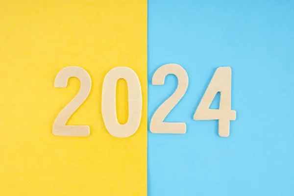Number 2024 Made Wooden Yellow Blue Background — Stock Photo, Image