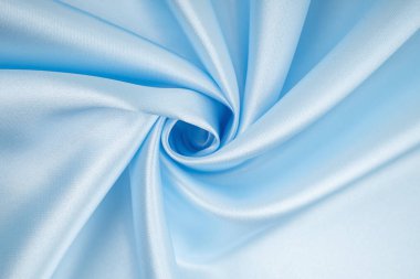 yumuşak kıvrımlar ve ışık mavi ipek vurgulamaktadır. tüm arka plan.