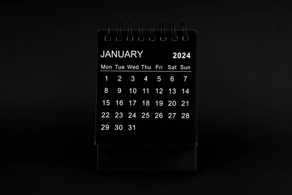 Black Calendar for January 2024 . Desktop calendar on a black color background.