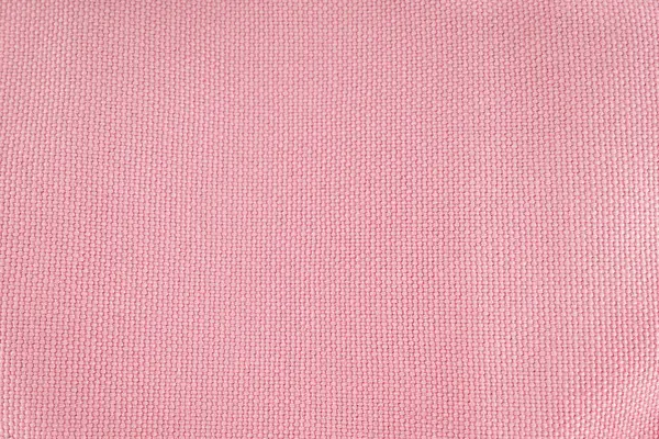 Pink canvas pastel fabric, background or texture.