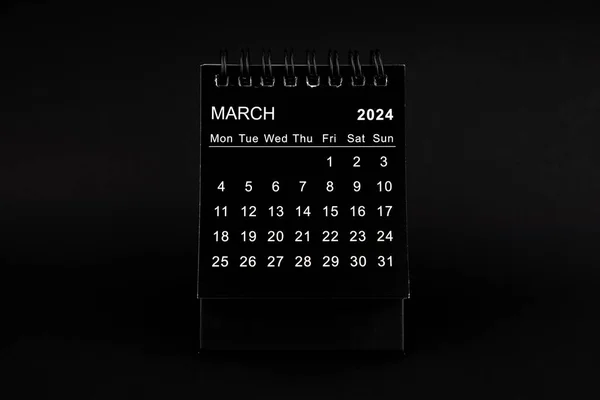 Black Calendar for March 2024. Desktop calendar on a black color background.