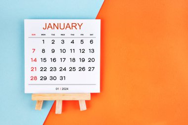 2024 Ocak takvim sayfası mavi ve turuncu arkaplan.