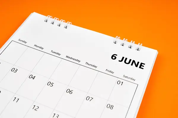 June 2024 month calendar on orange color cover background. Monthly calendar concepts.