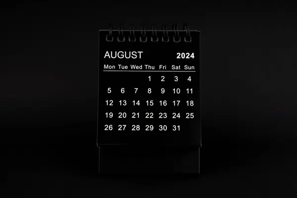 Black Calendar for August 2024. Desktop calendar on a black color background.