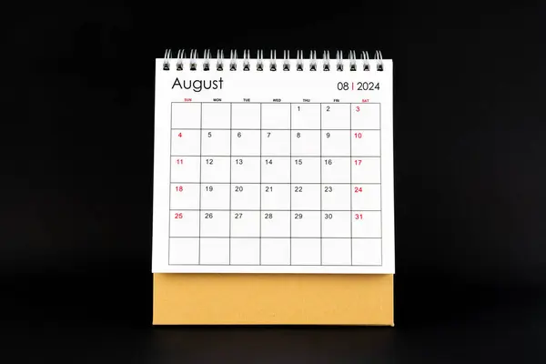 Desk Calendar for August 2024. Desktop calendar on a black color background.
