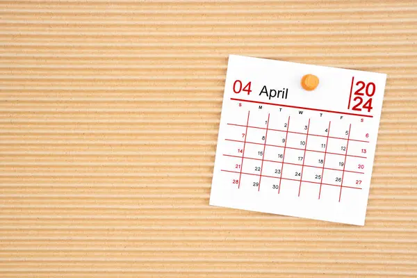 April 2024 Kalendersida Med Push Pin Brun Papp Bakgrund Stockbild