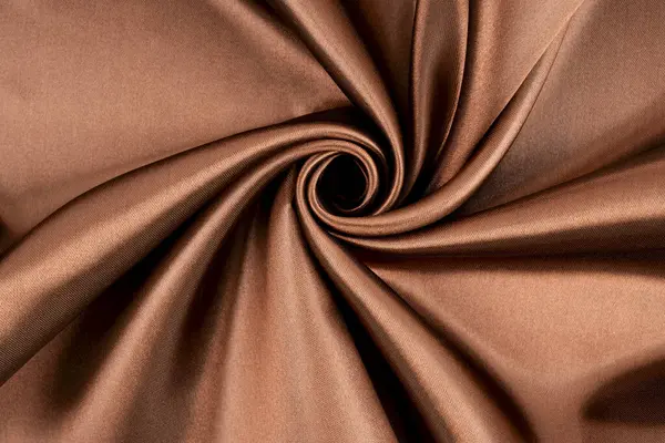 stock image Brown background luxury cloth or wavy folds of grunge silk texture.