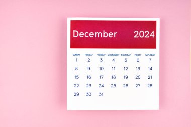 Takvim sayfası Aralık 2024 Pembe arkaplan.