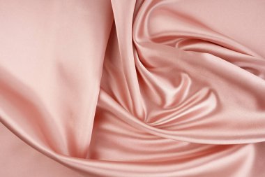Doku arkaplan modeli. Pembe renkli ipek kumaş.