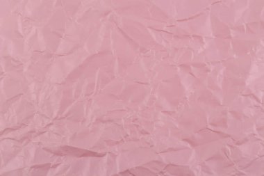Pembe Pembe yakın çekim parça kağıt doku bir zemin düzenleme olarak buruşuk.
