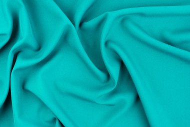 Arkaplan olarak yeşil ipek tekstil