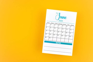 June 2025 calendar page on yellow color background. clipart