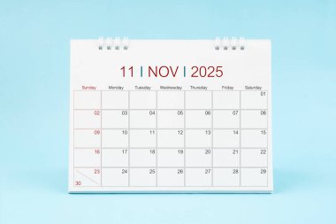 Kasım 2025, 2025 yılı için Mavi arkaplan aylık masa takvimi.