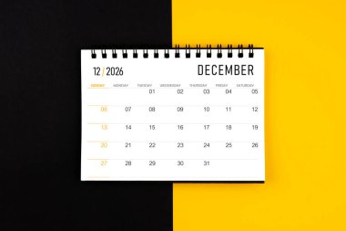 Aralık 2026 siyah ve sarı arkaplan takvimi, düz yatıyordu.