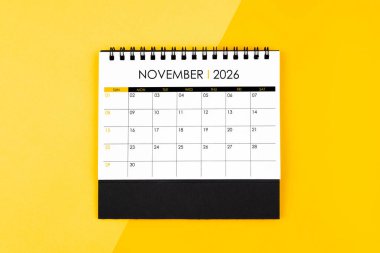 Randevu almak için 2026 yılının Kasım ayı takvimi sarı zemin üzerinde.