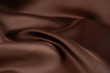 Koyu kahverengi ipek dokusu, arkaplan olarak soyut.