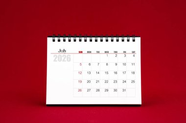Kırmızı arkaplanda Temmuz 2026 Boş masa takvimi.