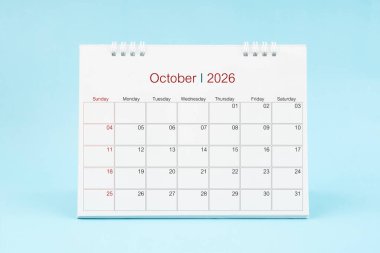 Ekim 2026, Mavi arka planda 2026 yılı için aylık masa takvimi.