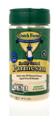 Winneconne, WI - 8 January 2023: A package of Dutch Farms freshly grated Parmesan cheese on an isolated background.