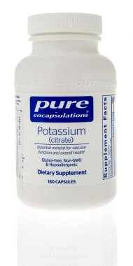 Winneconne, WI - 8 January 2023: A bottle of Pure potassium supplement on an isolated background.
