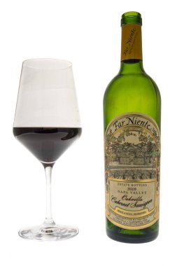 Winneconne, WI - 8 January 2023: A bottle of Far Niente Napa Valley Oakville cabernet sauvignon wine on an isolated background.