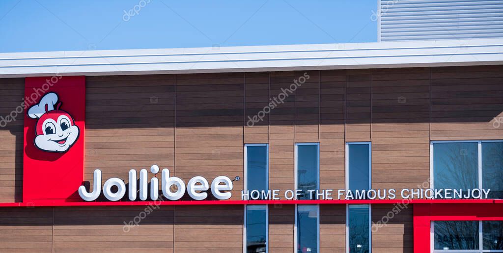 Chicago, IL - 19 March 2023: A Jollibee resturant sign home of the famous chickenjoy