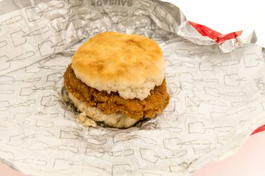 Winneconne, WI - 15 October 2024: A package of Wendys honey buddy chicken biscuit breakfast  on an isolated background. clipart