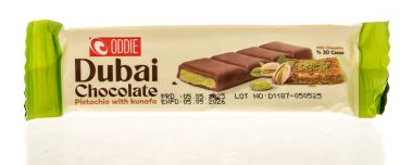 Winneconne, WI - 15 June 2025: A package of Oddie Dubai chocolate pistachio with kunafa on an isolated background.