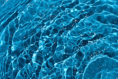 Mavi berrak su dalgalanması arkaplanı