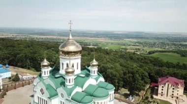 Top view of the Bancheni monastery church taken in Bancheni Ukraine in September 2020. Drone filming quadcopter in high quality bitrate. Panoramic and slow motion shots. High quality 4k footage