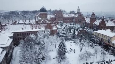 superb view from a height of the snow-covered old town. Cold weather, long streets. Gorgeous mystical mesmerizing view and decorative city, scenic architecture, ope, scenic Urban city residential