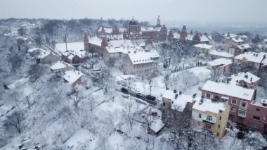 superb view from a height of the snow-covered old town. Cold weather, long streets. Gorgeous mystical mesmerizing view and decorative city, scenic architecture, ope, scenic Urban city residential