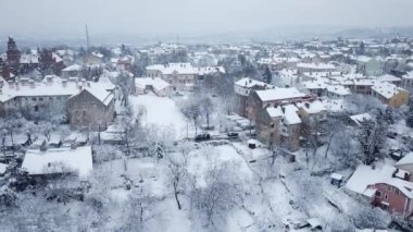 superb view from a height of the snow-covered old town. Cold weather, long streets. Gorgeous mystical mesmerizing view and decorative city, scenic architecture, ope, scenic Urban city residential