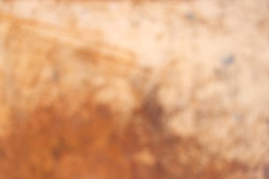 Bulanık paslı eski grunge oksitlenmiş metal yüzey kahverengi turuncu desen arkaplan.