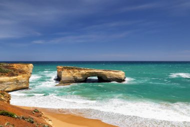 London Bridge, a famous rock arch in the Port Campbell National Park at the Great Ocean Road in Victoria, Australia. clipart