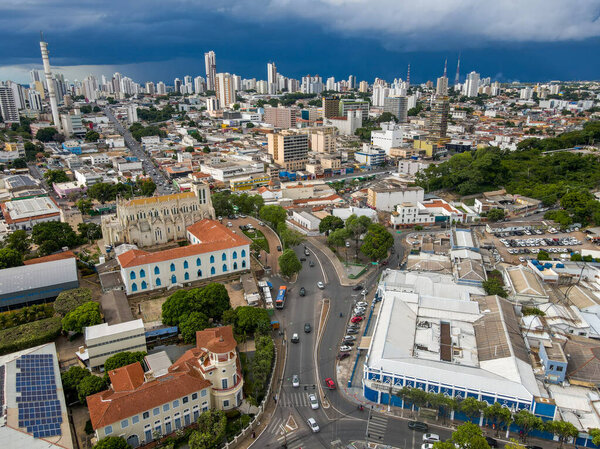 Aerial city scape in summer with storm clouds in Cuiaba Mato Grosso Brazil