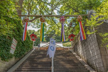 Brightly coloured traditional decorations, called tanabata (star festival) kazari at Enoshima shrine, Enoshima island, Fujisawa, Kanagawa prefecture, Japan.