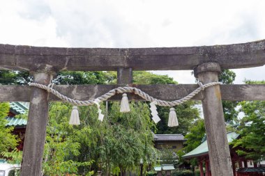 Sacred rope, or shimenawa, and zigzag streamers, or shide, at shinto shrine, Kanazawa, Japan.