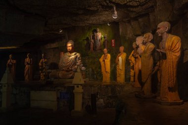 Tableaux of hell at Hanibe caves, Ishikawa, Japan.
