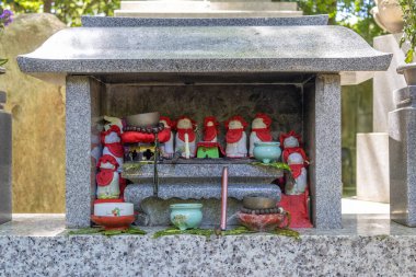 Stone statues of Ojizou san, protector of children and protector of travellers, Japan.
