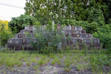 Stone statues of Ojizou san, protector of children and protector of travellers, and tombs Japan.